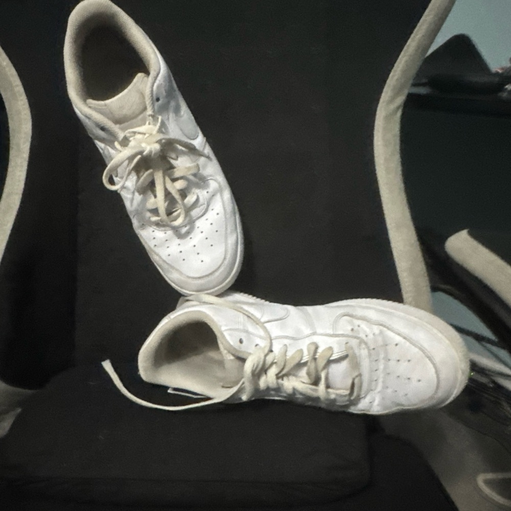 Triple white Air Force 1s